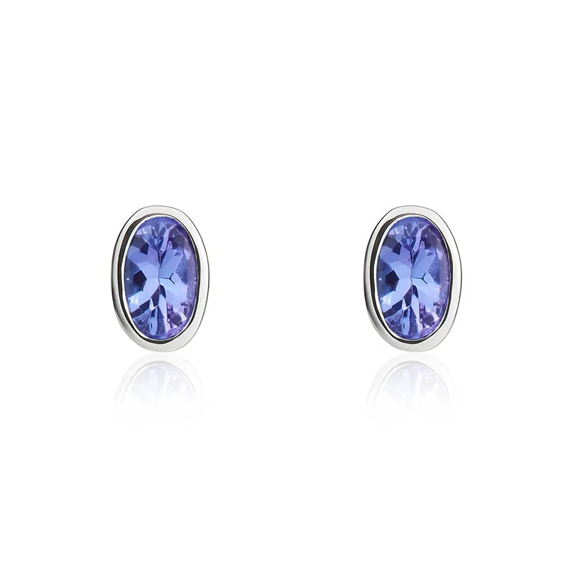 9ct White Gold Tanzanite 5x3mm Oval Rub Over Set Stud Earrings