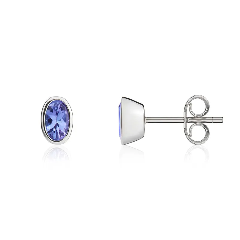 9ct White Gold Tanzanite 5x3mm Oval Rub Over Set Stud Earrings